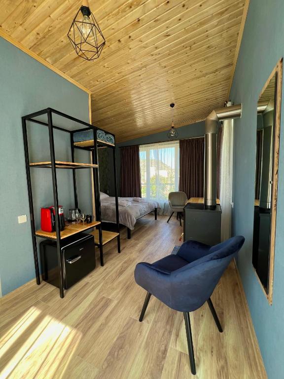 Postel nebo postele na pokoji v ubytování Kazbegi Green Yard