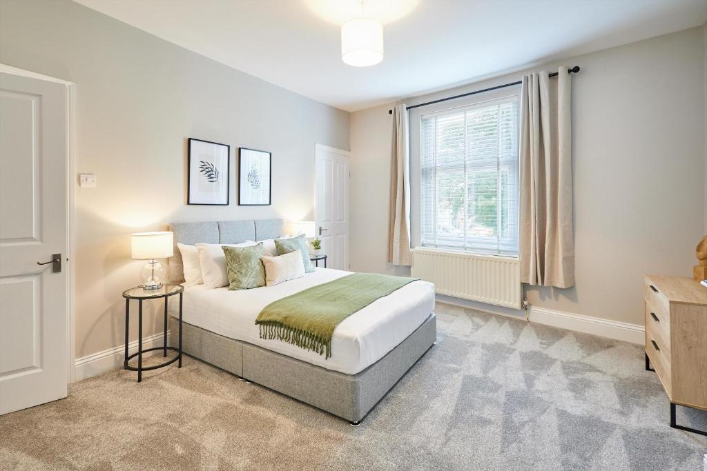 a bedroom with a bed and a window at Host & Stay - Dove Cottage in Bearpark