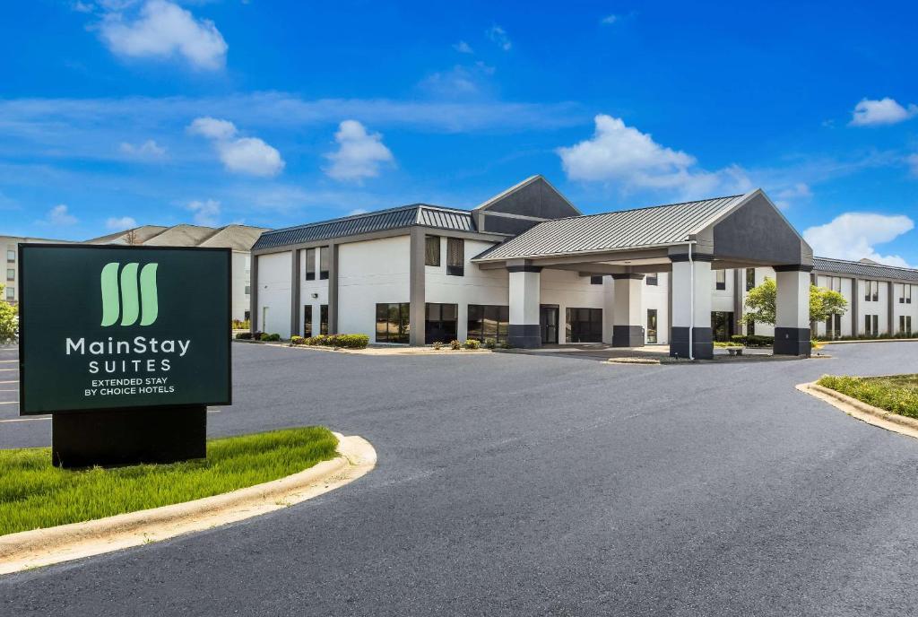 a sign in front of a motelstay suites building at MainStay Suites Bourbonnais - Kankakee in Bourbonnais