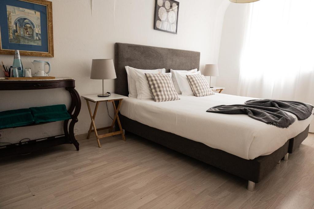 Postel nebo postele na pokoji v ubytování Vintage Guest House - Casa do Escritor