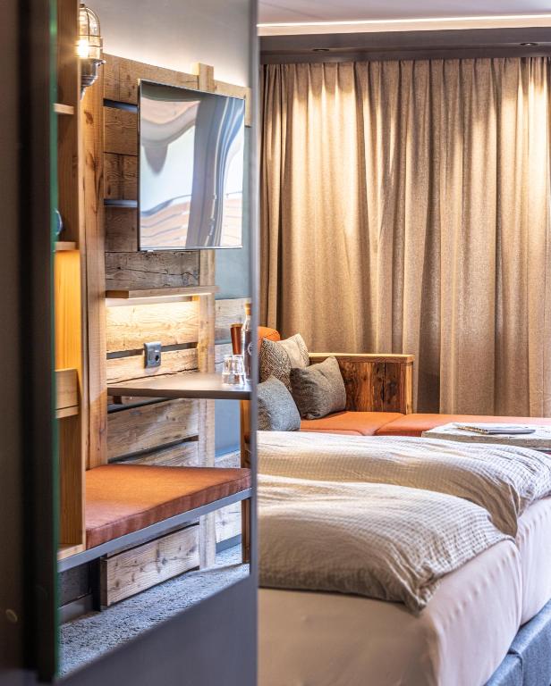 Cama o camas de una habitación en BaseCamp Hotel