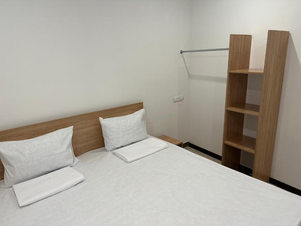 Postel nebo postele na pokoji v ubytování FAVORIT HOTEL-HOSTEL