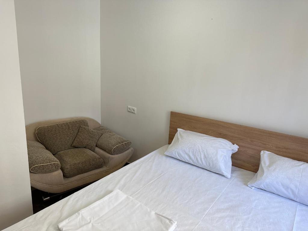 Postel nebo postele na pokoji v ubytování FAVORIT HOTEL-HOSTEL