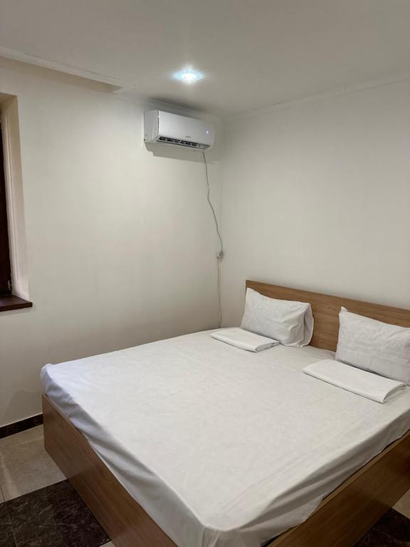 Postel nebo postele na pokoji v ubytování FAVORIT HOTEL-HOSTEL