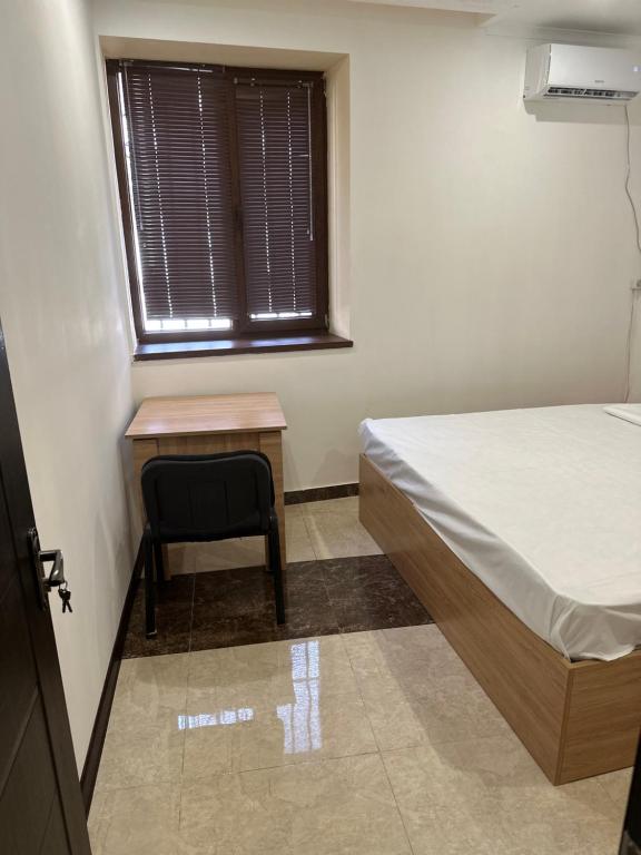 Postel nebo postele na pokoji v ubytování FAVORIT HOTEL-HOSTEL