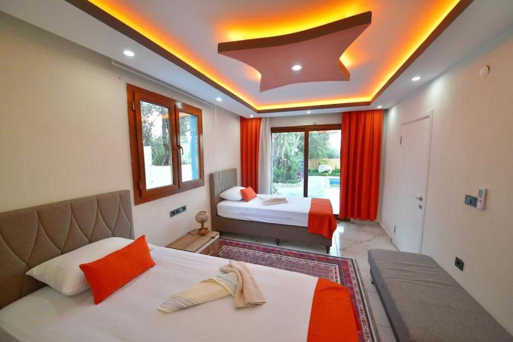 Llit o llits en una habitació de Villa Gökçe Sultan