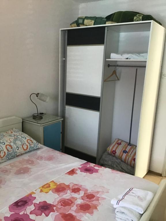 Postel nebo postele na pokoji v ubytování Apartments Subotic