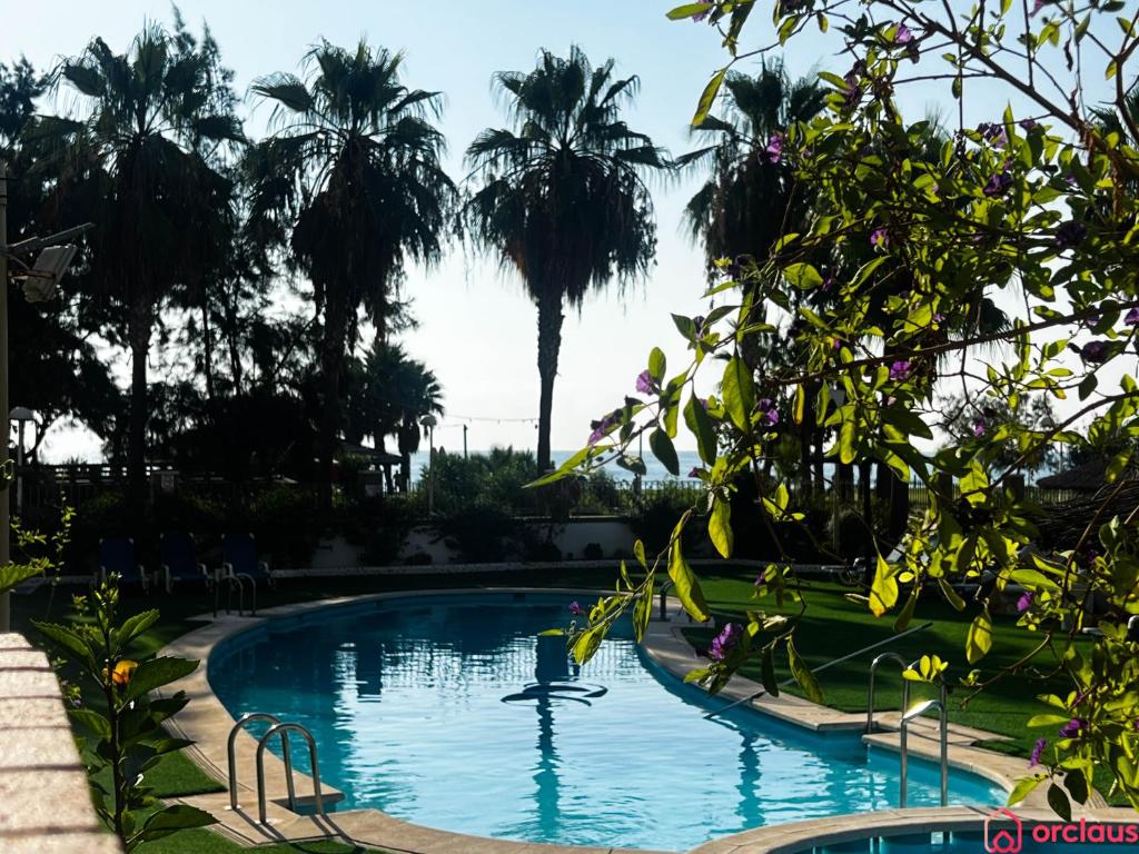 Bazén v ubytování Acapulco Paradise 1era Línea nebo v jeho okolí
