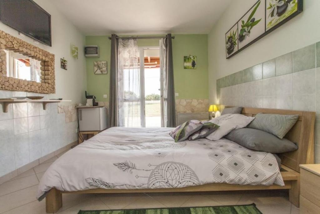 Postel nebo postele na pokoji v ubytování Villa Jany- Adults only
