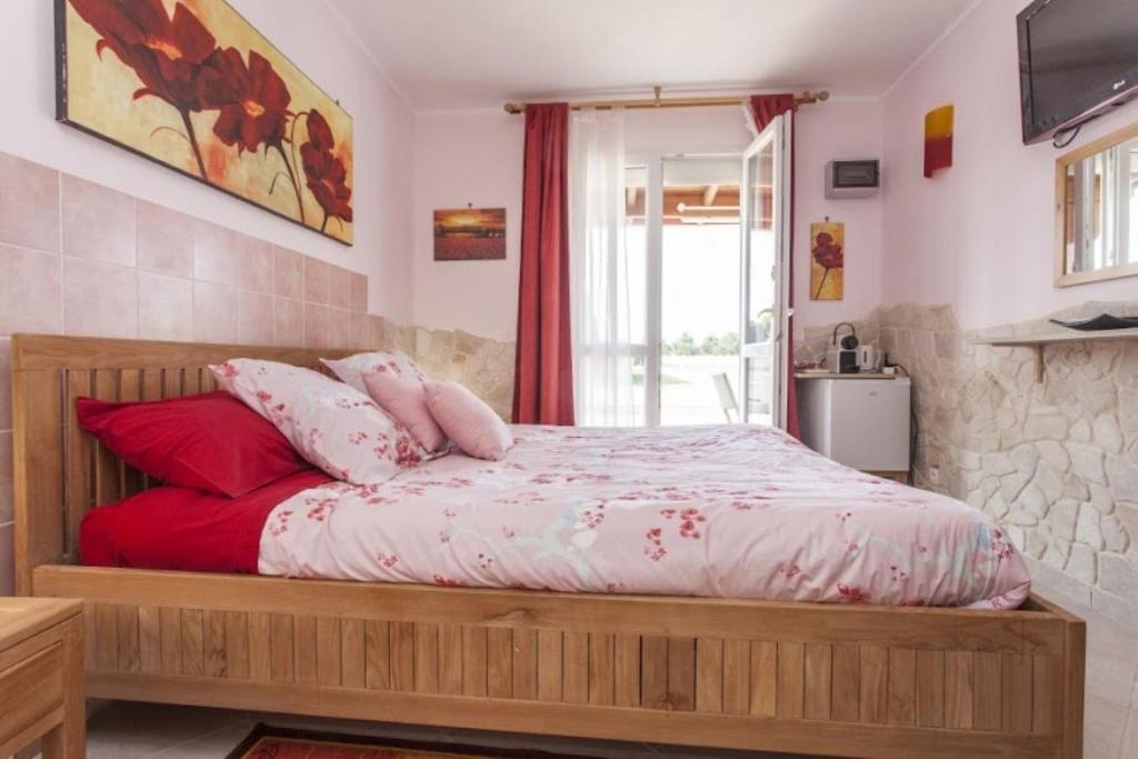 Postel nebo postele na pokoji v ubytování Villa Jany- Adults only