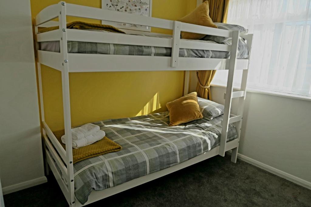 Krevet ili kreveti u jedinici u objektu Seaside House Broadstairs by the Beach with Parking