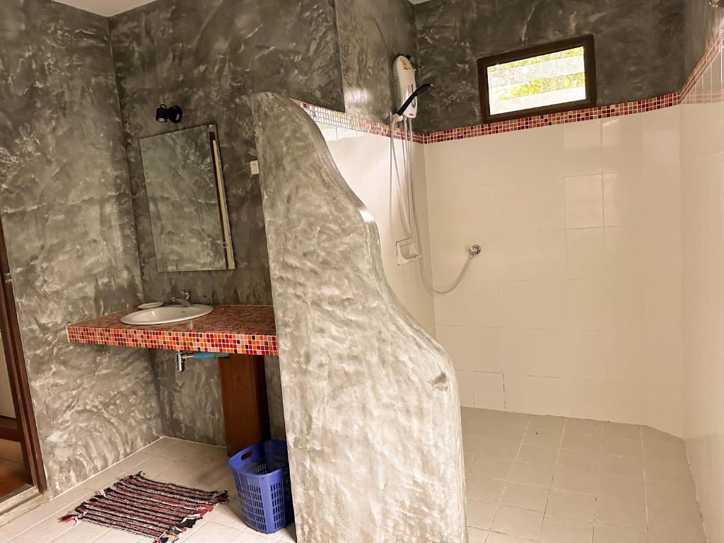 Koupelna v ubytování Pairadise Hotel