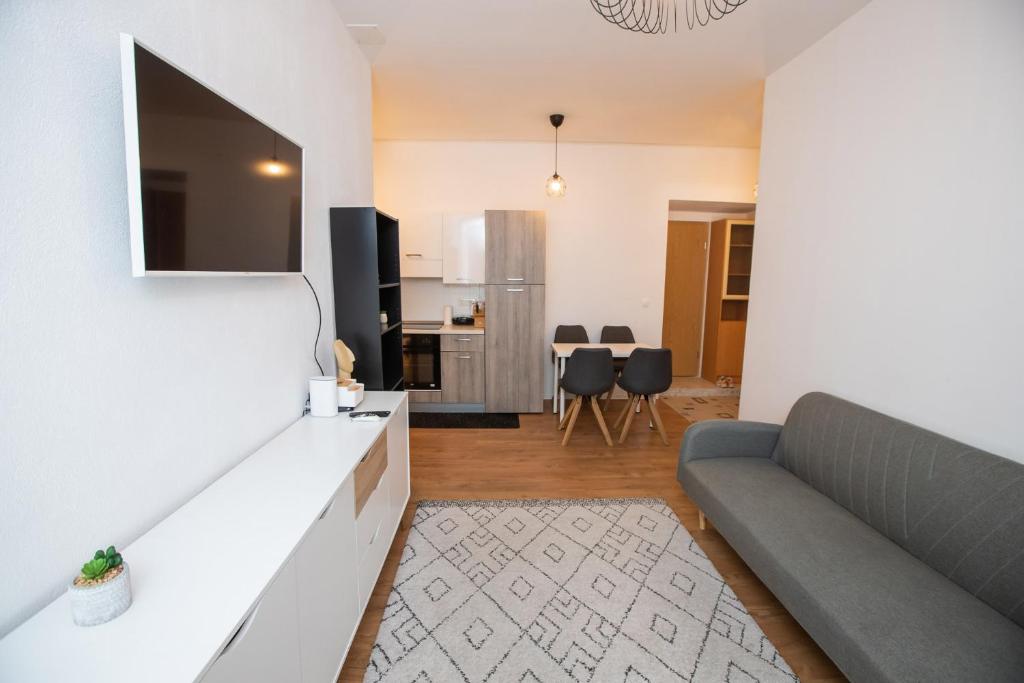 Area tempat duduk di Newly adapted 3-room apartment