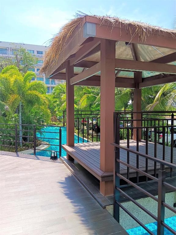 a pavilion next to a pool at a resort at Laguna Beach Resort 3 Maldives in Jomtien Beach