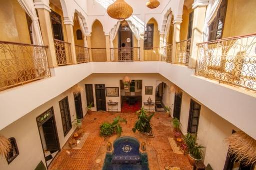 an overhead view of a living room in a building at Riad en Exlusivité à 5min de la place jamaa el fna in Marrakesh