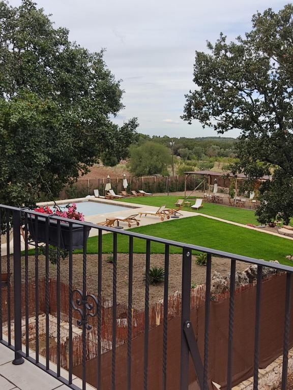 a view of a park from a balcony at Supramurgia Agribistrot in Cassano delle Murge