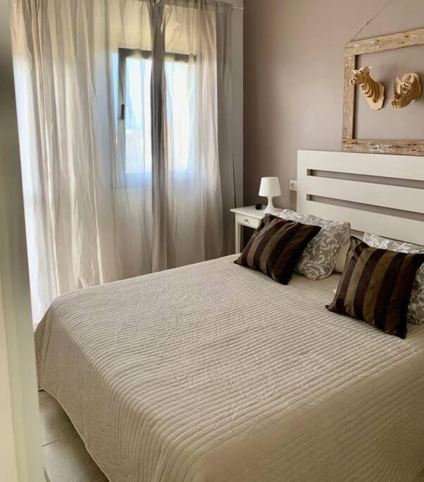 Kép Casa Fra - su 2 piani, confortevole e accogliente, Wi-Fi, piscina szállásáról Costa Calmában a galériában