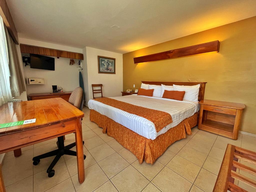 Postel nebo postele na pokoji v ubytování Best Western Riviera Tuxpan