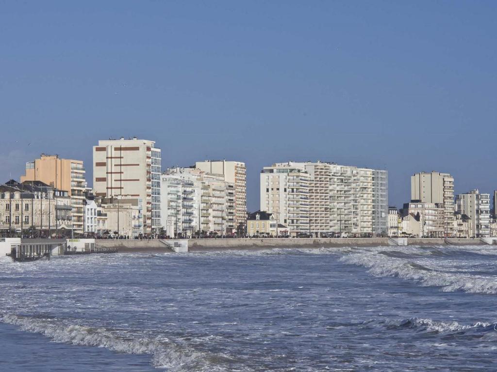 a body of water with buildings in the background at Maison Les Sables-d&#39;Olonne, 4 pièces, 6 personnes - FR-1-92-798 in Les Sables-d&#39;Olonne