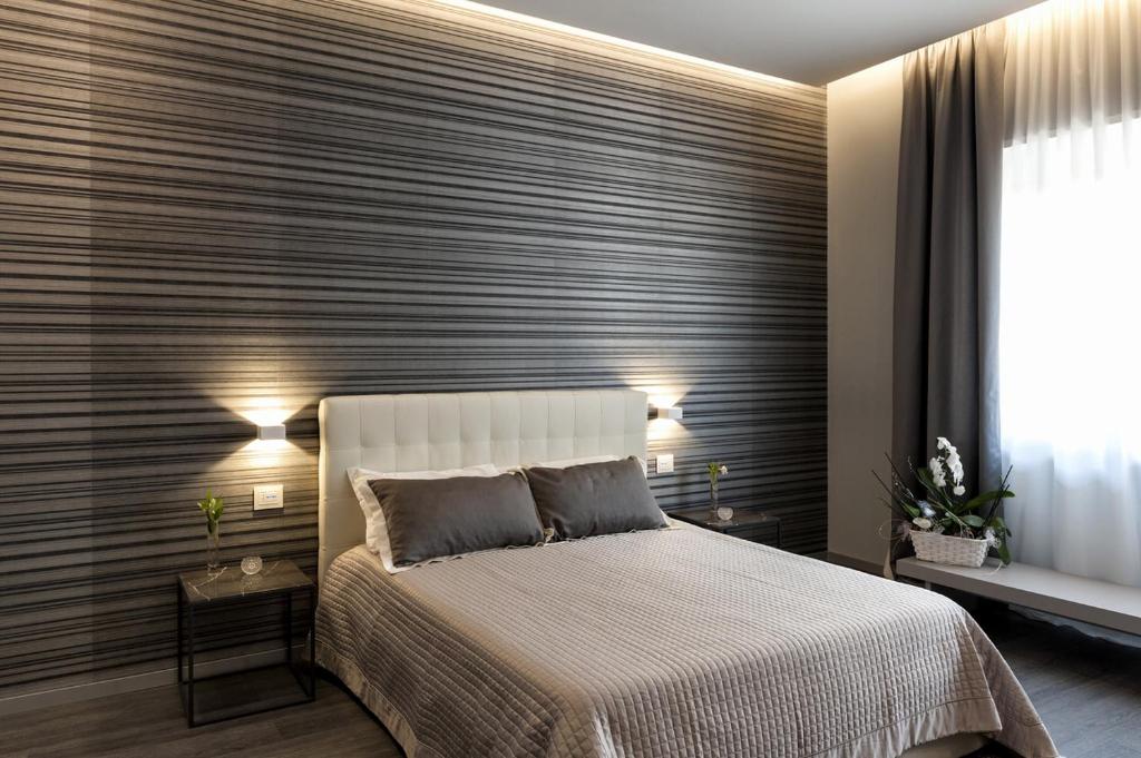 Postel nebo postele na pokoji v ubytování Borea Luxury B&B