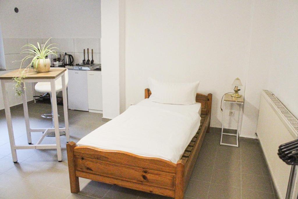 Postel nebo postele na pokoji v ubytování Ferienhaus Seilerbahn 17