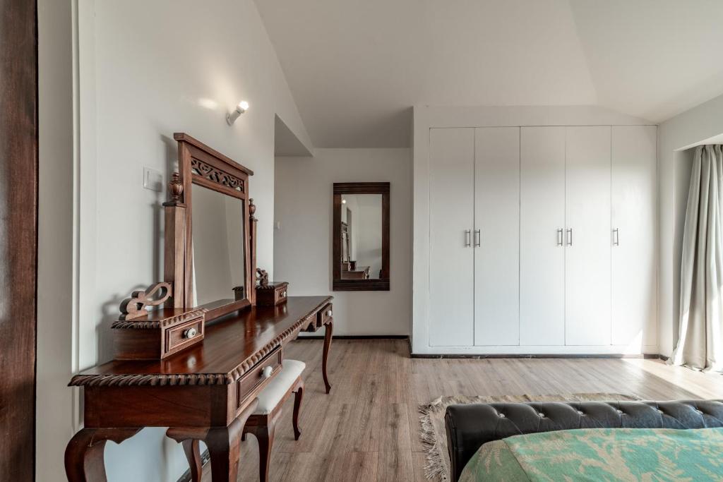 Postel nebo postele na pokoji v ubytování Ol Pejeta Mansion