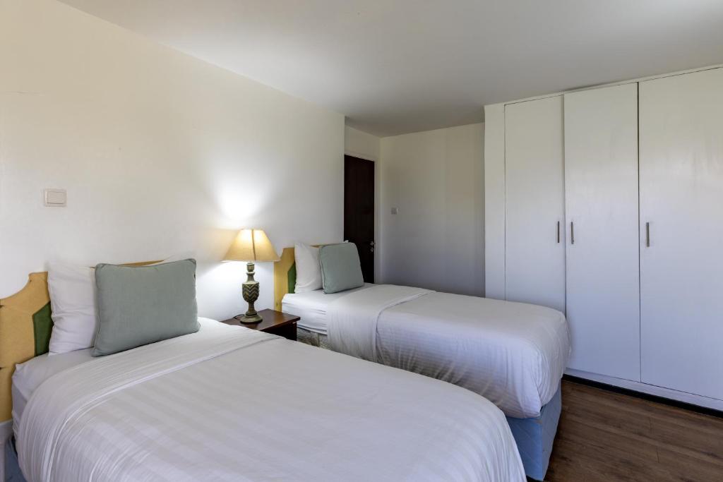 Postel nebo postele na pokoji v ubytování Ol Pejeta Mansion