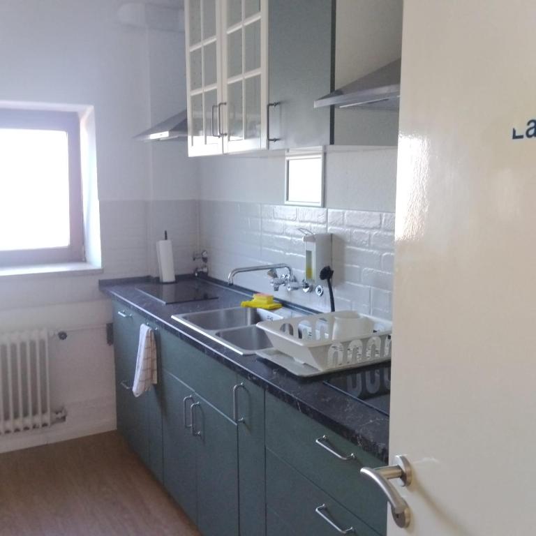 Kuchyň nebo kuchyňský kout v ubytování Monteurzimmer in Hamburg West bei Hansezimmer