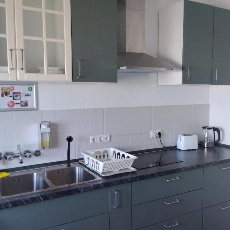 Kuchyň nebo kuchyňský kout v ubytování Monteurzimmer in Hamburg West bei Hansezimmer