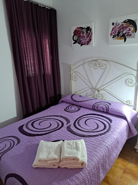 Cama o camas de una habitación en La Gonzala