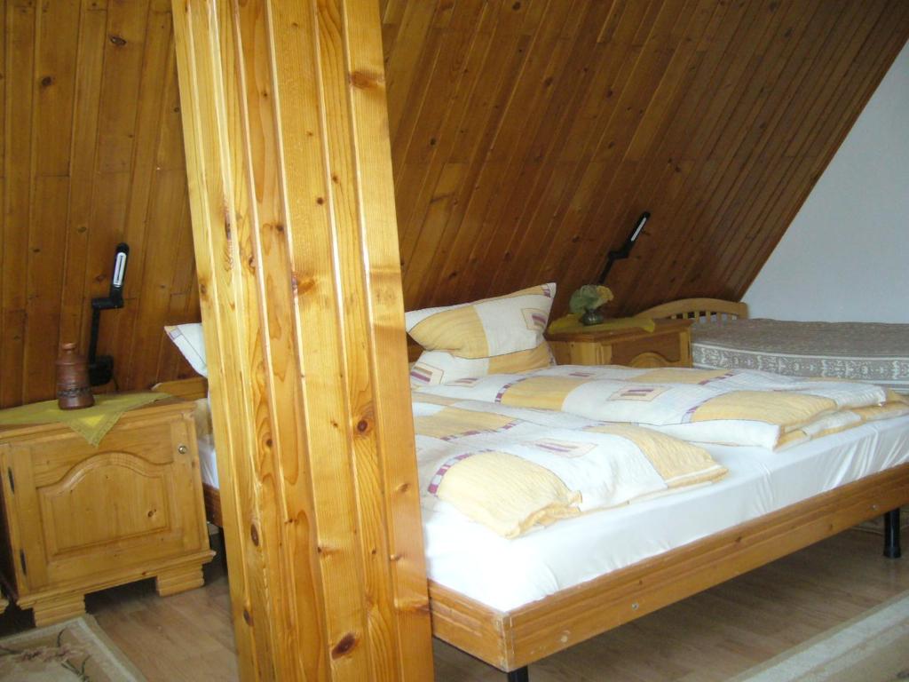 Postel nebo postele na pokoji v ubytování Csaki Vendeghaz