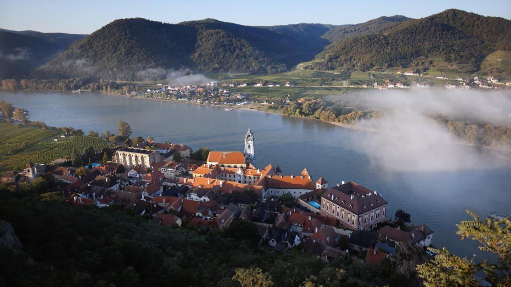 a small town on the shore of a lake at Hotel Schloss Dürnstein in Dürnstein