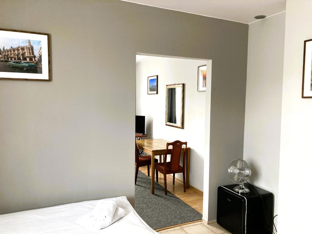TV a/nebo společenská místnost v ubytování Hotel Ava