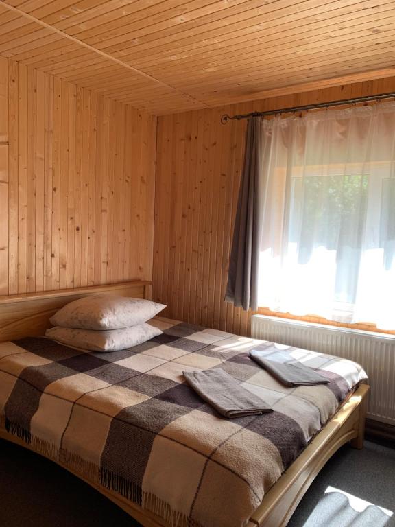 Postel nebo postele na pokoji v ubytování Hotel Novoe Shale