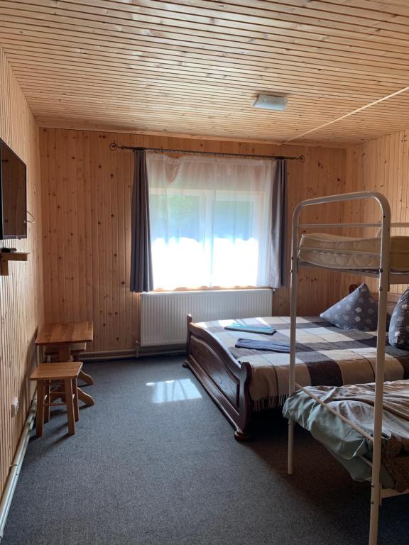 Postel nebo postele na pokoji v ubytování Hotel Novoe Shale