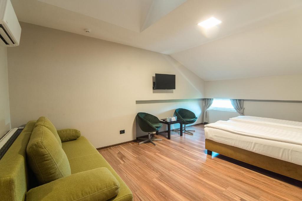 TV a/nebo společenská místnost v ubytování HOTEL VITAL
