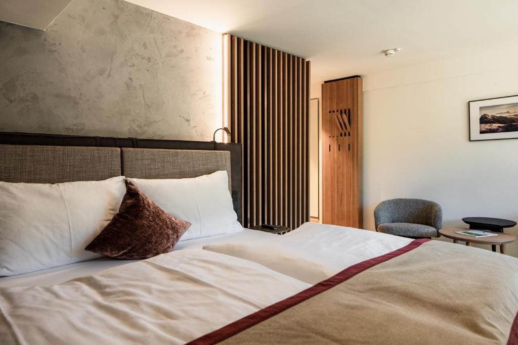 Postel nebo postele na pokoji v ubytování Hotel Salzburg
