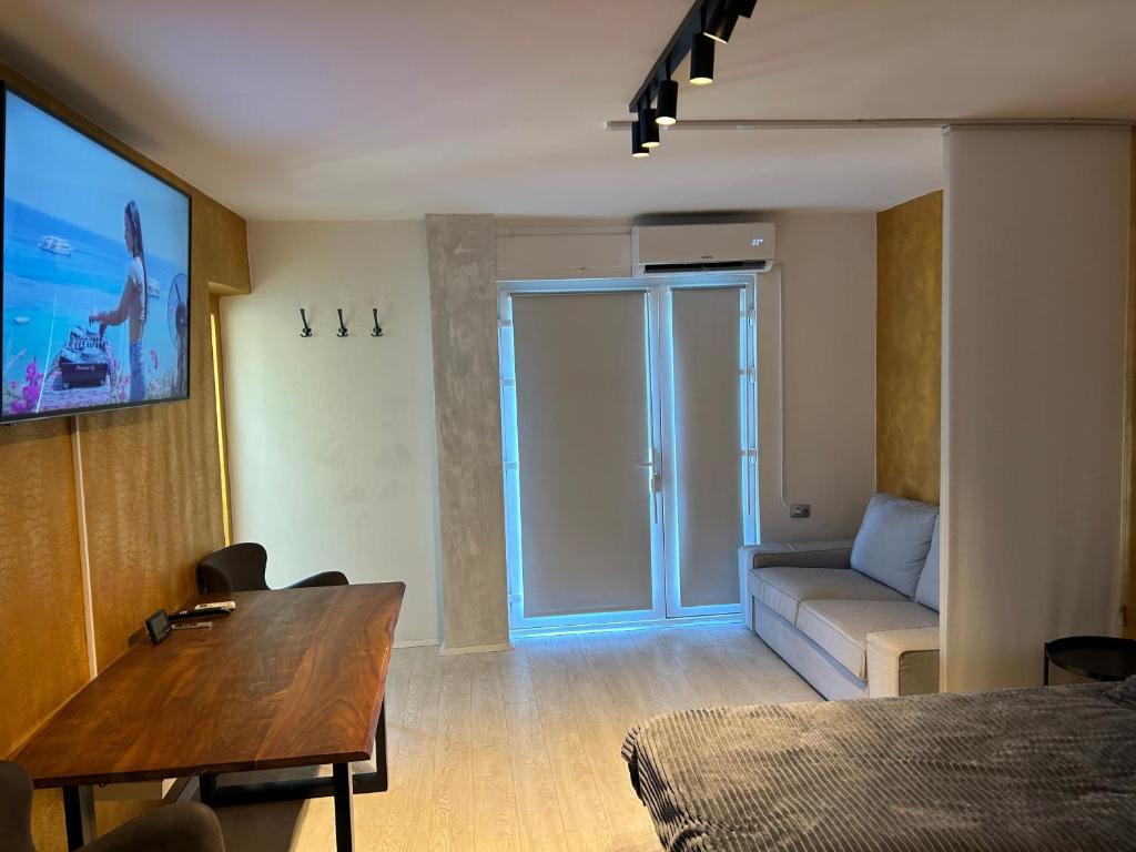 TV a/nebo společenská místnost v ubytování APARTMENT GAL