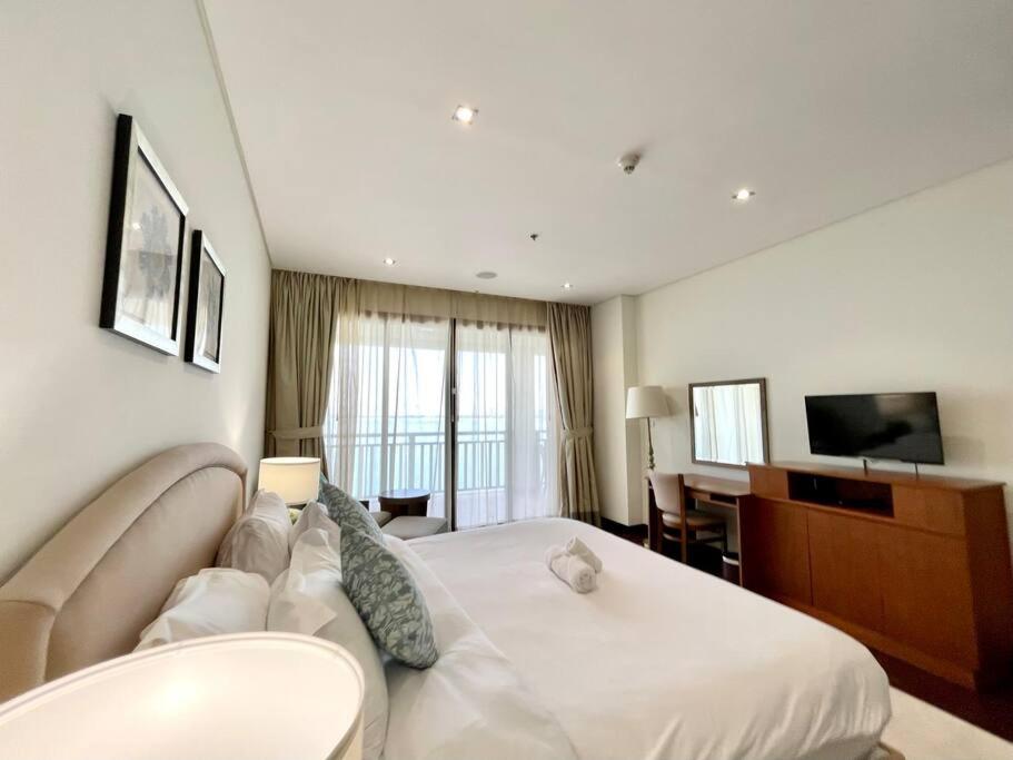 Fotografie z fotogalerie ubytování Dar Vacation - Spacious Seaview 2BR Apartment v Dubaji