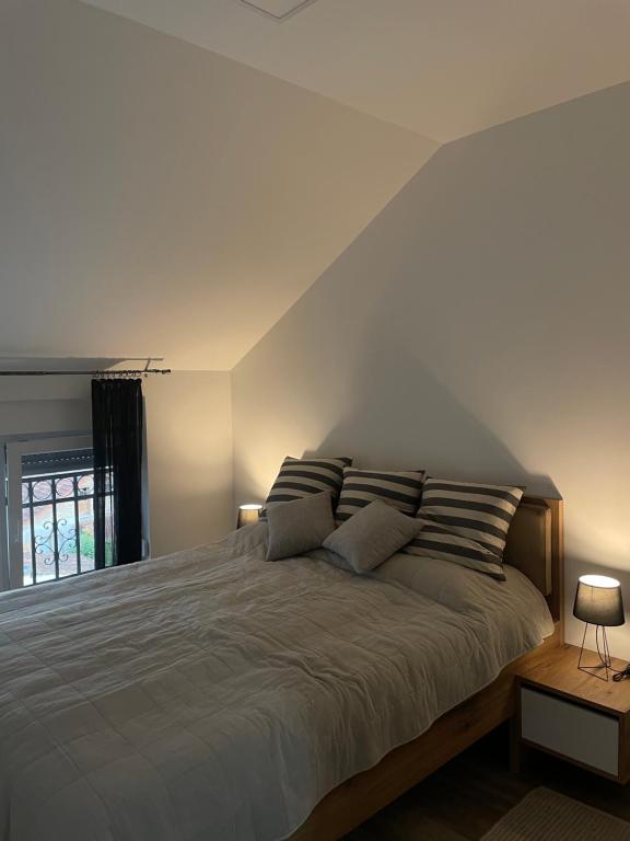 Ліжко або ліжка в номері Apartman Prodan