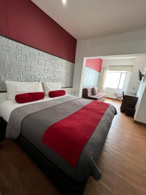 Postel nebo postele na pokoji v ubytování Hotel Florencia Plaza