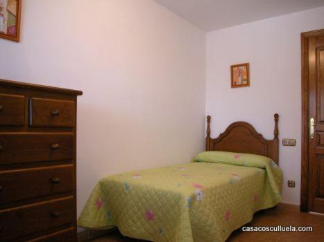 Postel nebo postele na pokoji v ubytování Casa Cosculluela