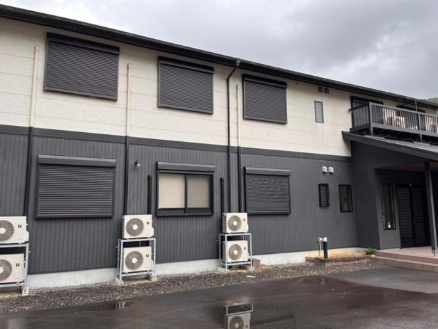 a building with three speakers in front of it at Guesthouse Hatenashi - Vacation STAY 43938v in Hongu