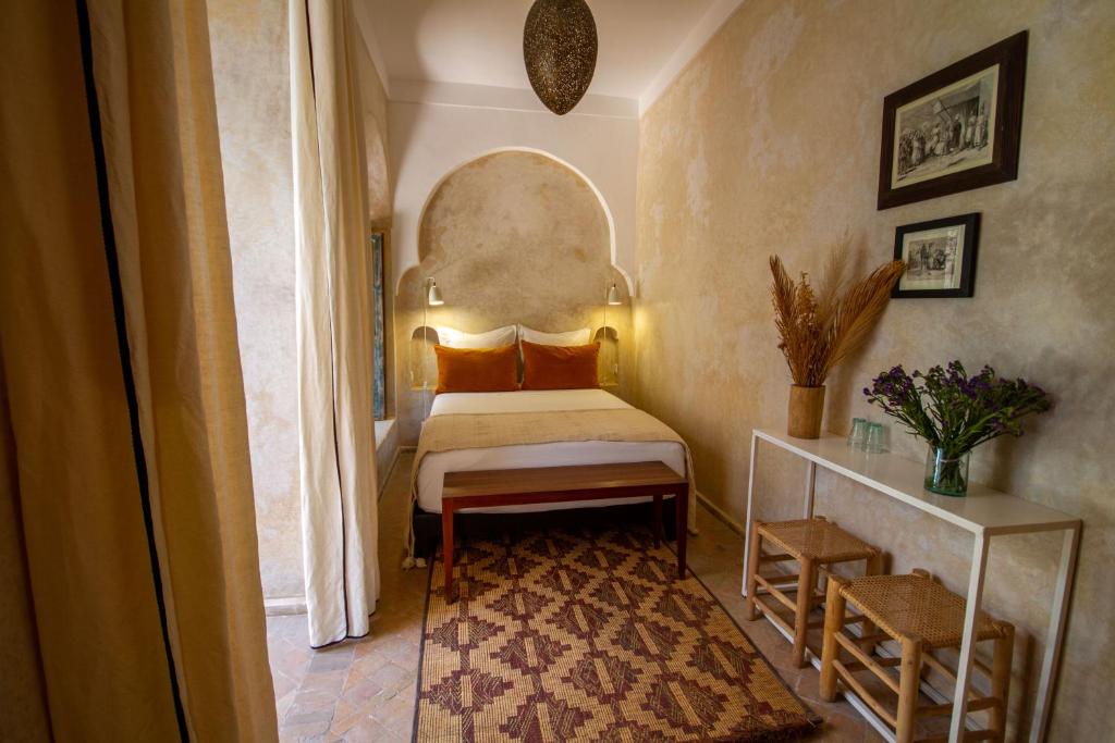 Postel nebo postele na pokoji v ubytování Riad Bab 54