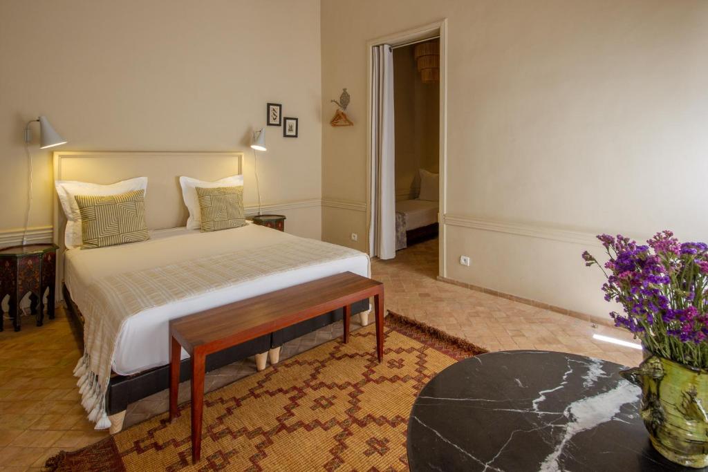 Postel nebo postele na pokoji v ubytování Riad Bab 54