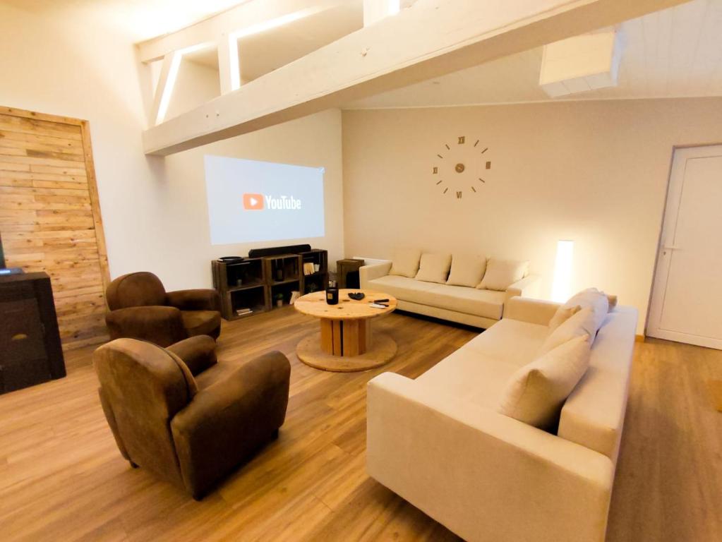 Posezení v ubytování Sublime appartement hyper centre Hirson