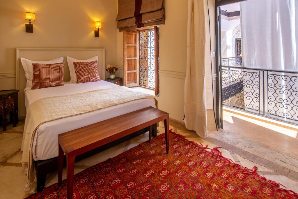 Postel nebo postele na pokoji v ubytování Riad Bab 54