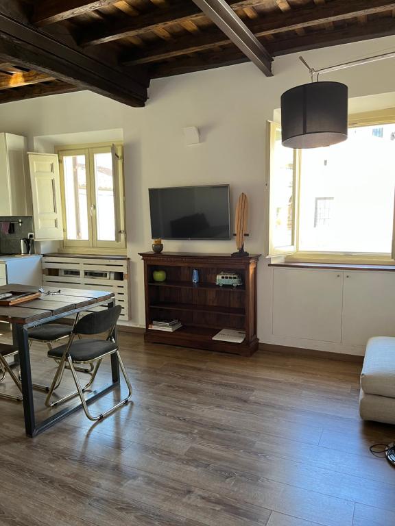 A television and/or entertainment centre at Colosseo Suite