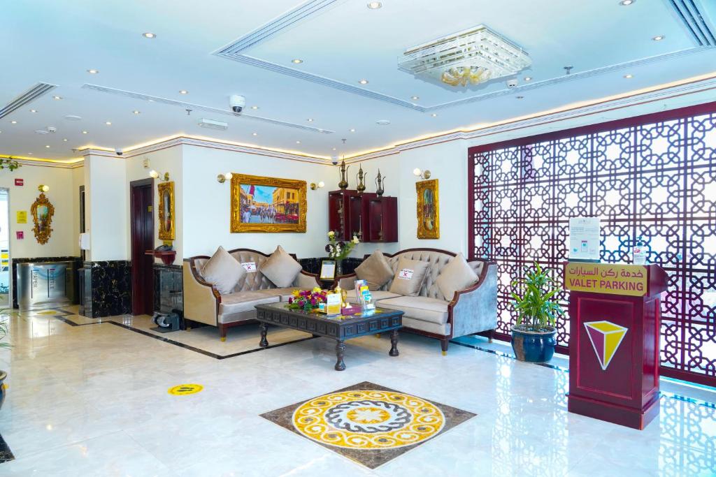 Posezení v ubytování La Villa Palace Hotel