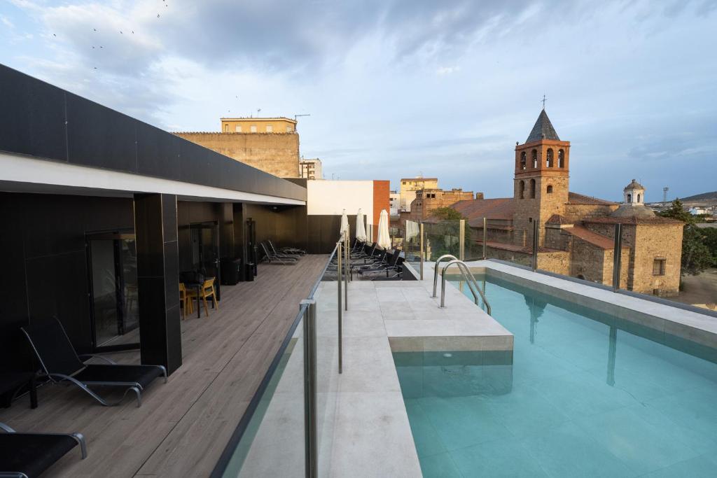 a swimming pool on the roof of a building at Hotel Aldama in Mérida